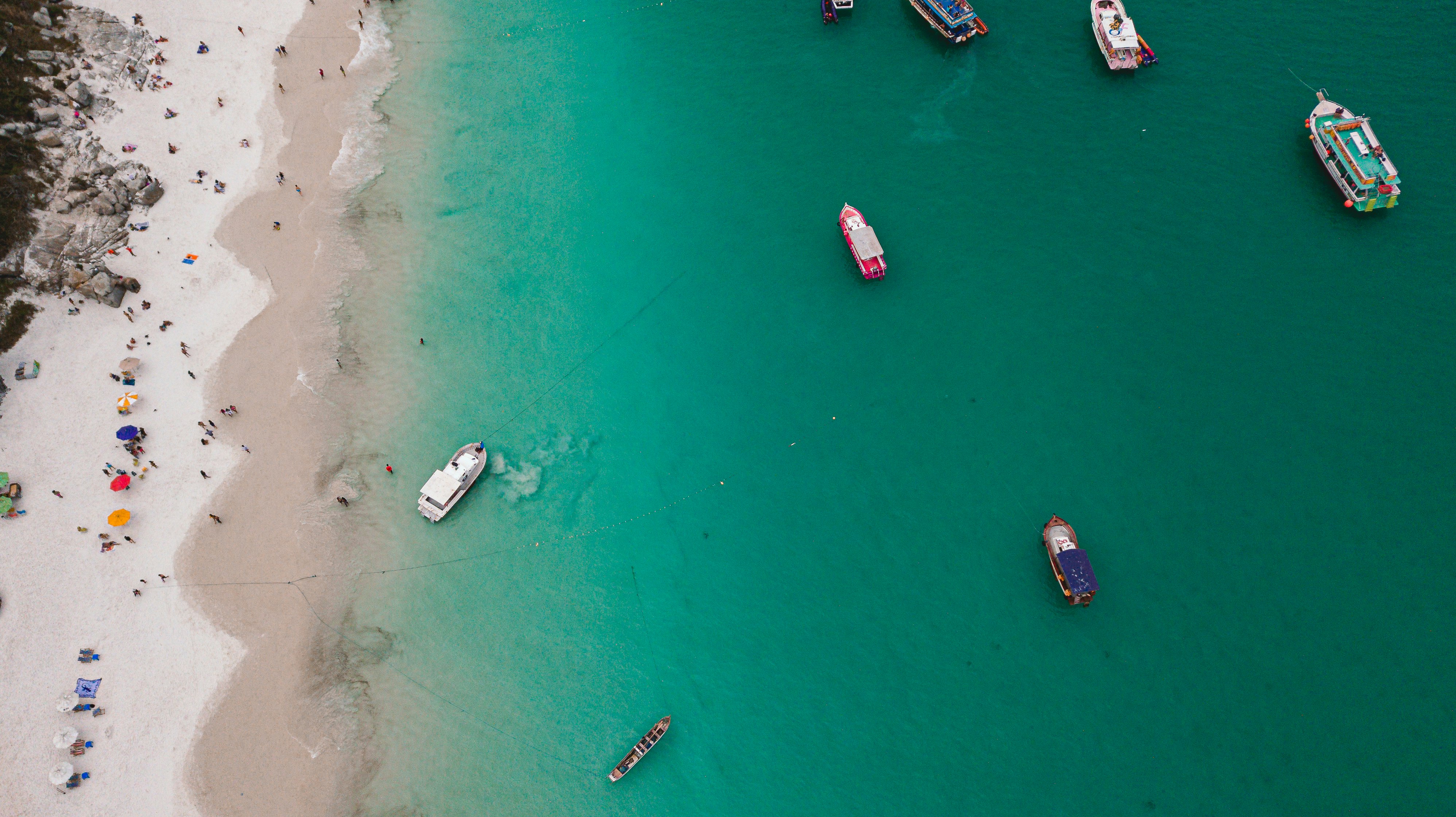 aerial view of boats on sea during daytime